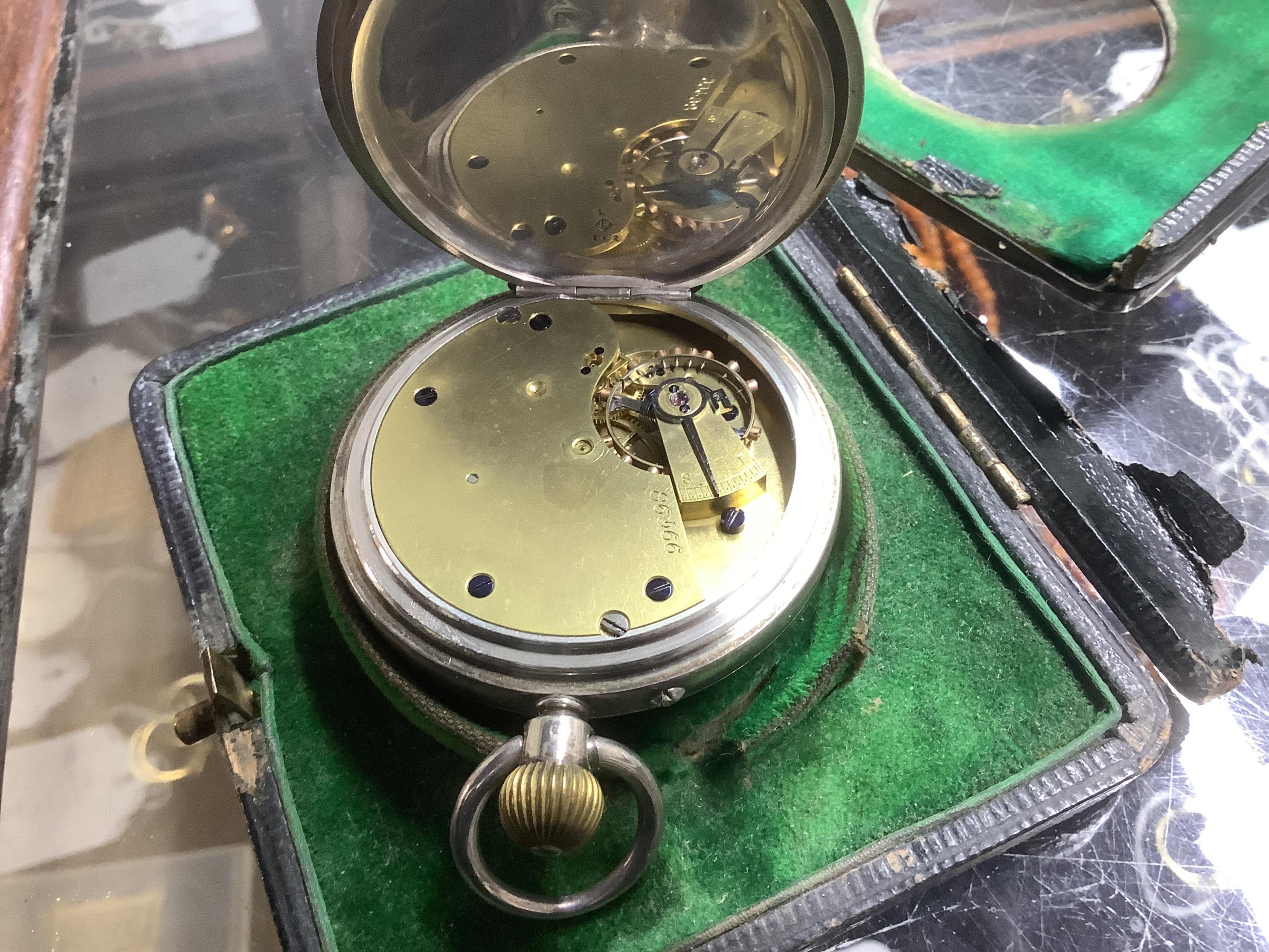 A George V silver sovereign/half sovereign case, by George Unite & Sons, Birmingham, 1911, 59mm, together with an Edwardian silver miniature free-standing model of a bird spice box with detachable head, import marks for